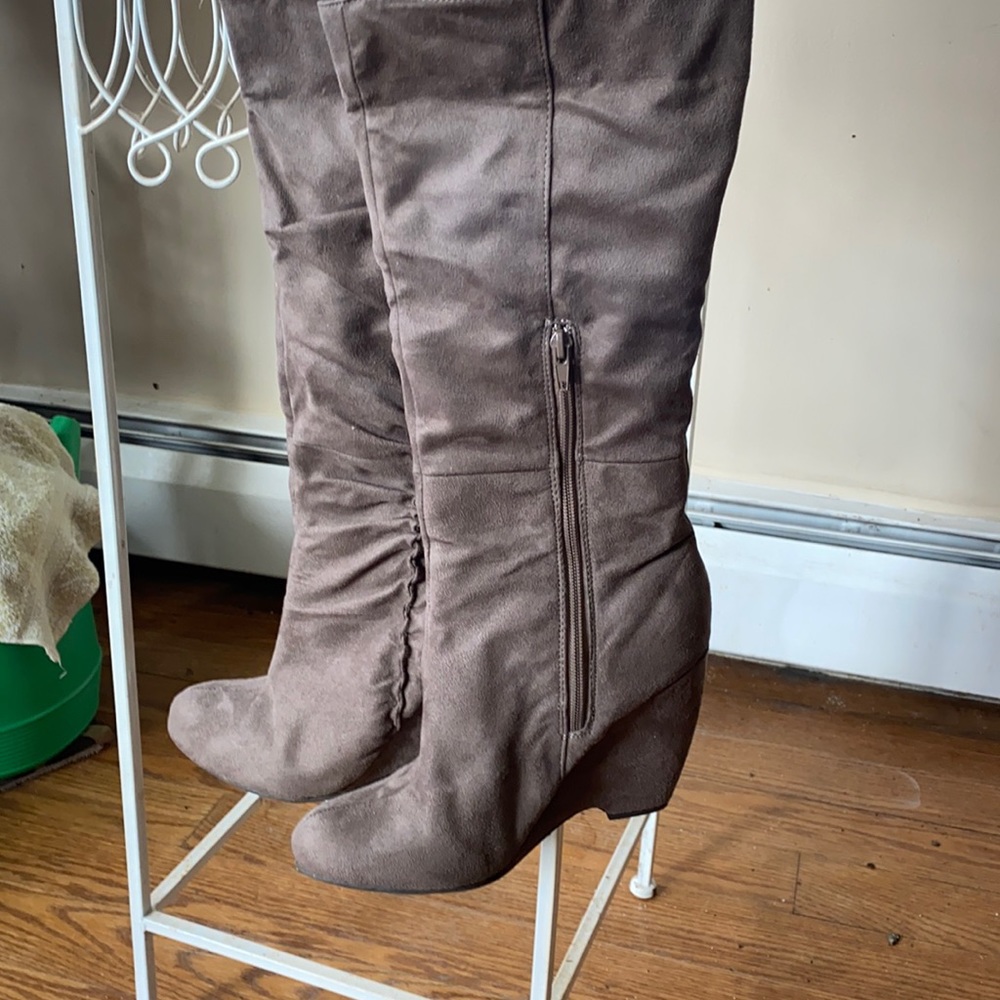 Taupe faux knee length wedge boots.